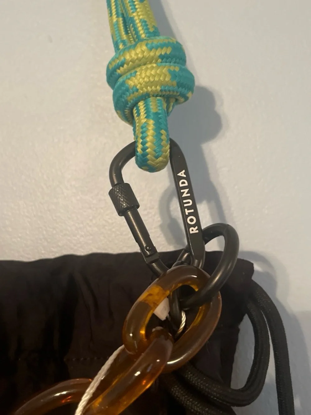 Rotunda Sant Hobo Bag with Green Braided Rope Handle and Amber Chain Accent